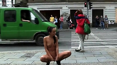 Naked Czech girl was walking through the city center